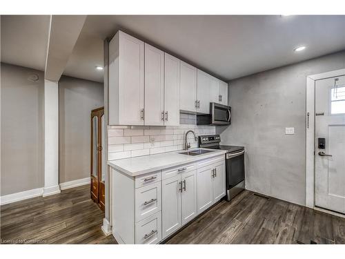 1-48 Shaw Street, Hamilton, ON - Indoor Photo Showing Kitchen With Double Sink