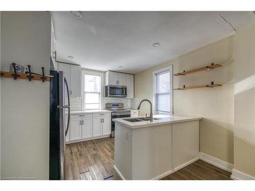 2-48 Shaw Street, Hamilton, ON - Indoor Photo Showing Kitchen With Double Sink