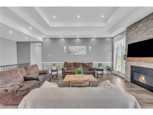 389 Concession 4 Road, Fisherville, ON - Indoor Photo Showing Living Room With Fireplace