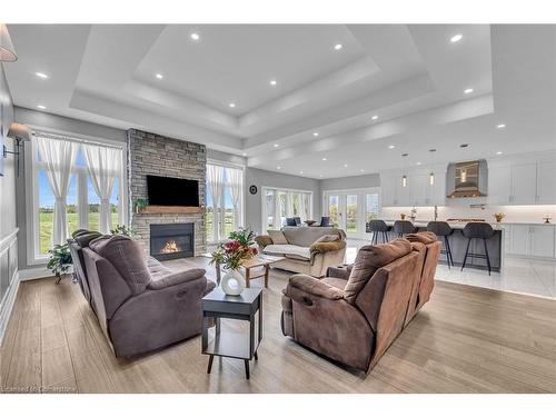 389 Concession 4 Road, Fisherville, ON - Indoor Photo Showing Living Room With Fireplace