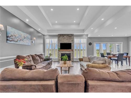 389 Concession 4 Road, Fisherville, ON - Indoor Photo Showing Living Room With Fireplace