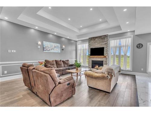 389 Concession 4 Road, Fisherville, ON - Indoor Photo Showing Living Room With Fireplace