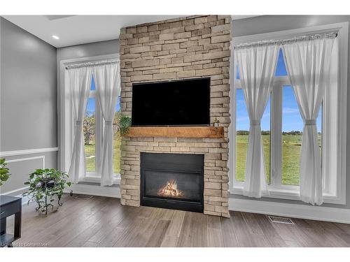 389 Concession 4 Road, Fisherville, ON - Indoor Photo Showing Living Room With Fireplace