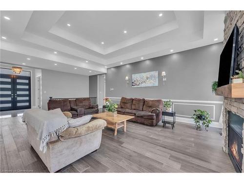 389 Concession 4 Road, Fisherville, ON - Indoor Photo Showing Living Room With Fireplace