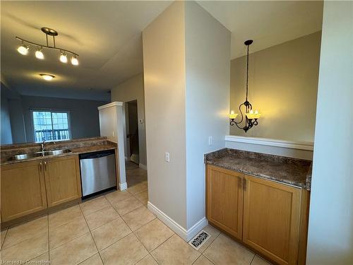 7-5080 Fairview Street, Burlington, ON - Indoor Photo Showing Kitchen With Double Sink