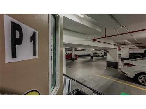 305-222 Jackson Street W, Hamilton, ON - Indoor Photo Showing Garage