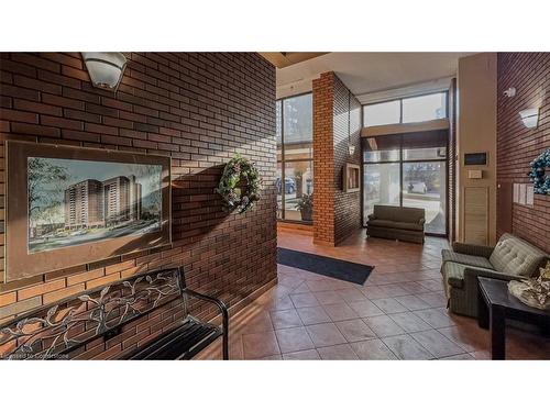 305-222 Jackson Street W, Hamilton, ON - Indoor With Fireplace