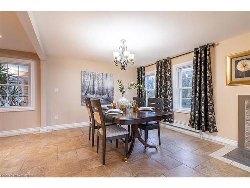 3324 Homestead Drive, Mount Hope, ON - Indoor Photo Showing Dining Room With Fireplace