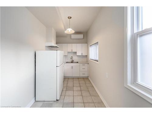 3-583 Cannon Street E, Hamilton, ON - Indoor Photo Showing Kitchen With Double Sink