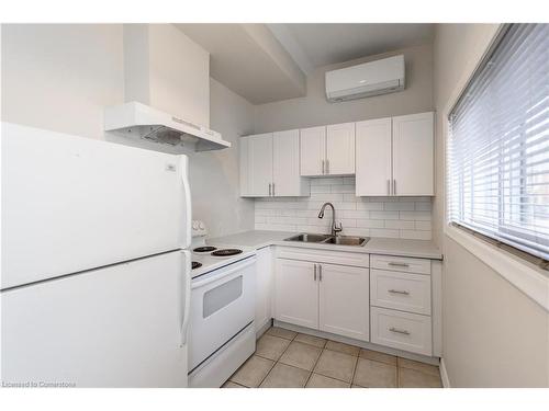 3-583 Cannon Street E, Hamilton, ON - Indoor Photo Showing Kitchen With Double Sink