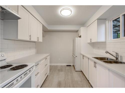 2-583 Cannon Street E, Hamilton, ON - Indoor Photo Showing Kitchen With Double Sink