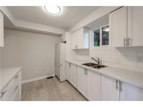 2-583 Cannon Street E, Hamilton, ON - Indoor Photo Showing Kitchen With Double Sink