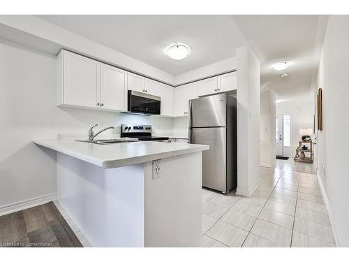 3110 Michelangelo Road, Burlington, ON - Indoor Photo Showing Kitchen With Double Sink