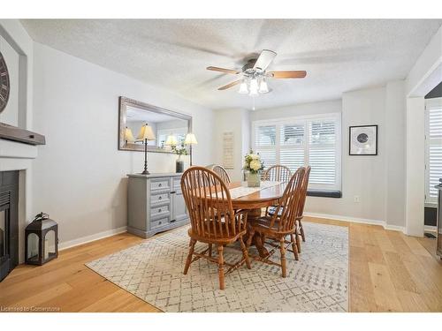 5160 Ridgewell Road, Burlington, ON - Indoor Photo Showing Dining Room With Fireplace