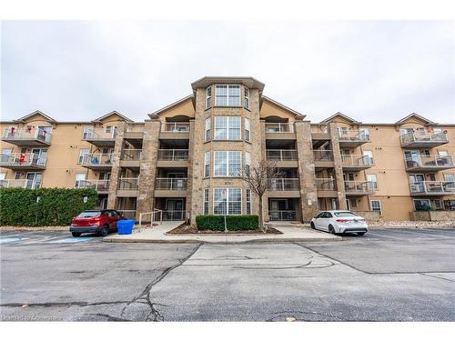 206-1830 Walkers Line, Burlington, ON - Outdoor With Balcony With Facade