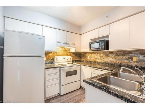 206-1830 Walkers Line, Burlington, ON - Indoor Photo Showing Kitchen With Double Sink