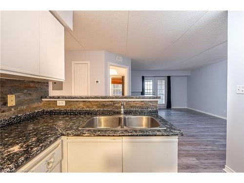 206-1830 Walkers Line, Burlington, ON - Indoor Photo Showing Kitchen With Double Sink