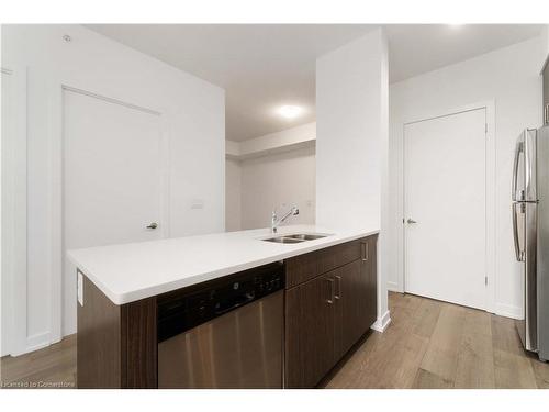 304-550 North Service Road, Grimsby, ON - Indoor Photo Showing Kitchen With Double Sink