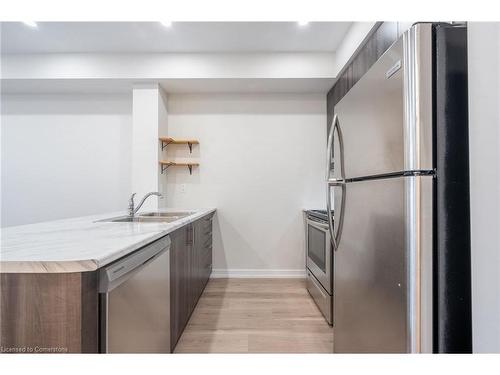 205-125 Shoreview Place, Stoney Creek, ON - Indoor Photo Showing Kitchen With Double Sink