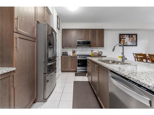 24 Whithorn Crescent, Caledonia, ON - Indoor Photo Showing Kitchen With Double Sink