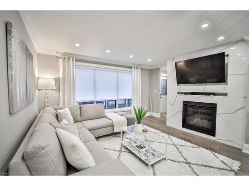 31 Nuffield Drive, Toronto, ON - Indoor Photo Showing Living Room With Fireplace