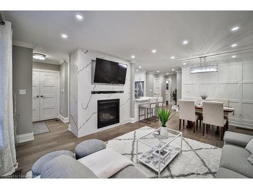 31 Nuffield Drive, Toronto, ON - Indoor Photo Showing Living Room With Fireplace