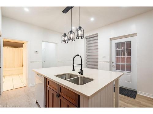 Main-106 Wentworth Street S, Hamilton, ON - Indoor Photo Showing Kitchen With Double Sink