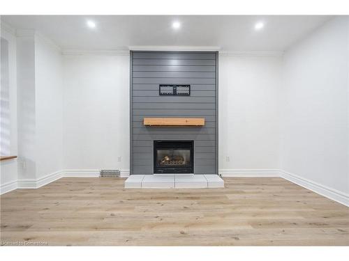 Main-106 Wentworth Street S, Hamilton, ON - Indoor With Fireplace