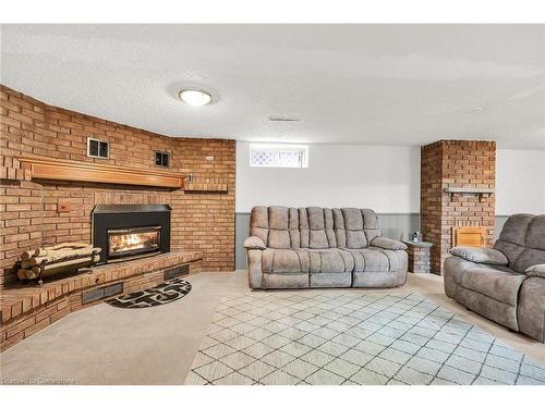 253 Thorner Drive, Hamilton, ON - Indoor Photo Showing Living Room With Fireplace