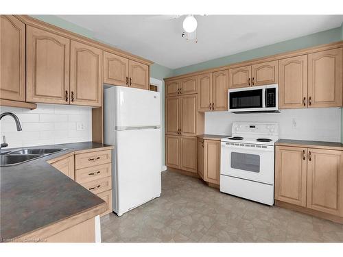 77 Main Street E, Grimsby, ON - Indoor Photo Showing Kitchen With Double Sink