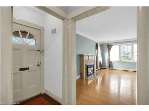 77 Main Street E, Grimsby, ON - Indoor Photo Showing Other Room With Fireplace