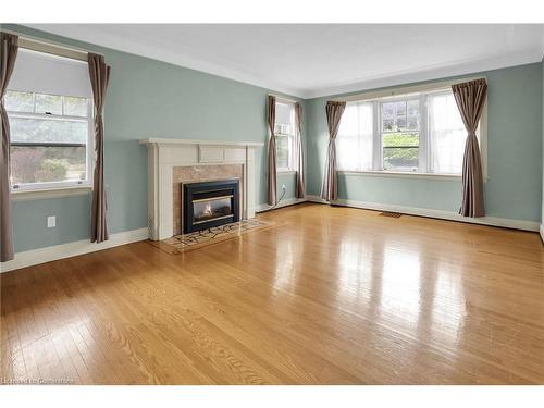 77 Main Street E, Grimsby, ON - Indoor Photo Showing Living Room With Fireplace