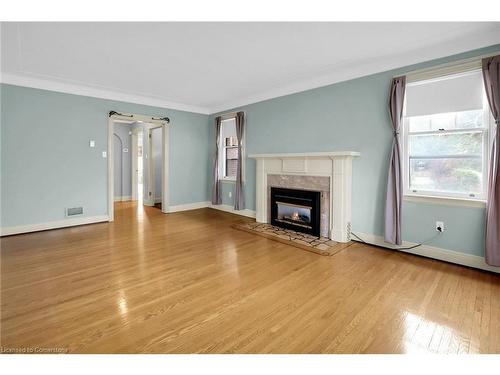 77 Main Street E, Grimsby, ON - Indoor Photo Showing Living Room With Fireplace