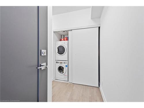 206-57 St Joseph Street, Toronto, ON - Indoor Photo Showing Laundry Room