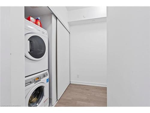 206-57 St Joseph Street, Toronto, ON - Indoor Photo Showing Laundry Room