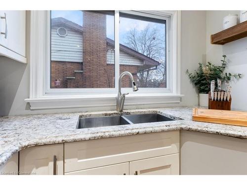 129 West 27Th Street, Hamilton, ON - Indoor Photo Showing Kitchen With Double Sink