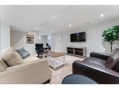 129 West 27Th Street, Hamilton, ON - Indoor Photo Showing Living Room With Fireplace