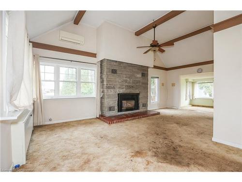 1 Grand Avenue, Grimsby, ON - Indoor Photo Showing Living Room With Fireplace