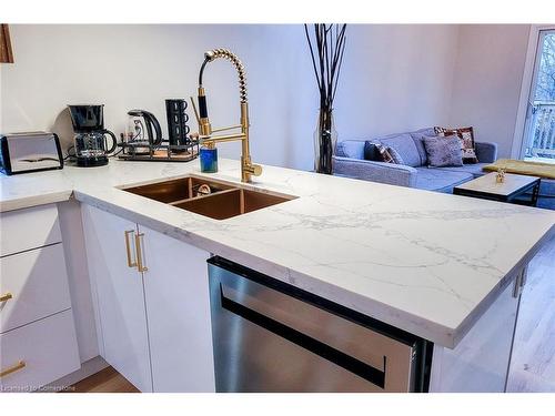 5759 Robinson Street, Niagara Falls, ON - Indoor Photo Showing Kitchen With Double Sink