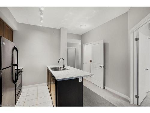 702-85 Robinson Street, Hamilton, ON - Indoor Photo Showing Kitchen With Double Sink