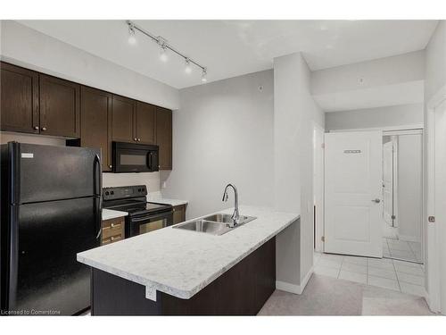 702-85 Robinson Street, Hamilton, ON - Indoor Photo Showing Kitchen With Double Sink