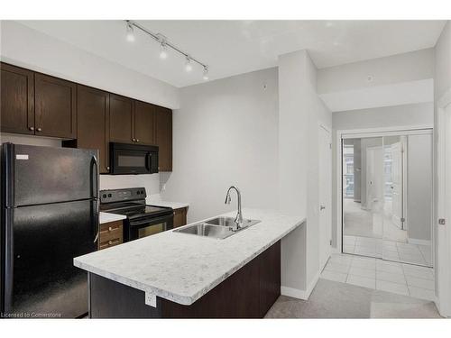 702-85 Robinson Street, Hamilton, ON - Indoor Photo Showing Kitchen With Double Sink