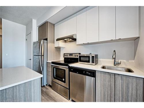 B309-5240 Dundas Street, Burlington, ON - Indoor Photo Showing Kitchen With Stainless Steel Kitchen