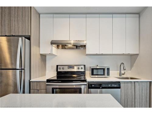 B309-5240 Dundas Street, Burlington, ON - Indoor Photo Showing Kitchen With Stainless Steel Kitchen With Upgraded Kitchen