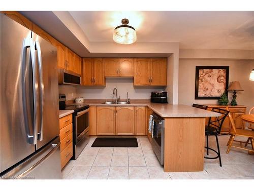 8-18 Cedar Street, Grimsby, ON - Indoor Photo Showing Kitchen With Double Sink