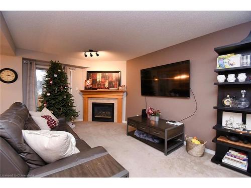 8-18 Cedar Street, Grimsby, ON - Indoor Photo Showing Living Room With Fireplace