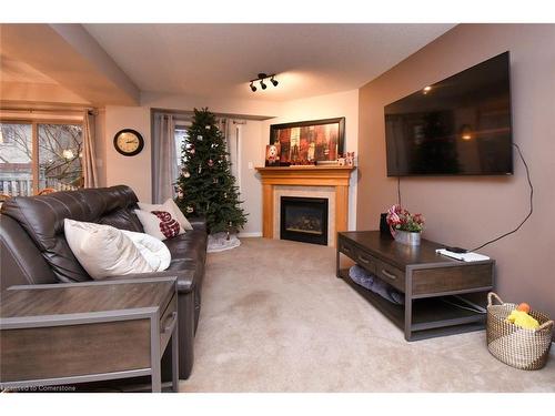 8-18 Cedar Street, Grimsby, ON - Indoor Photo Showing Living Room With Fireplace