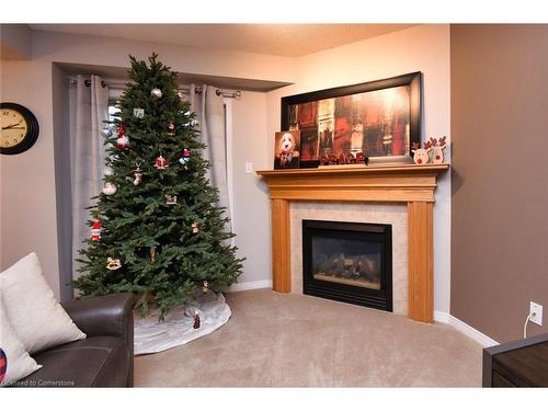 8-18 Cedar Street, Grimsby, ON - Indoor Photo Showing Living Room With Fireplace