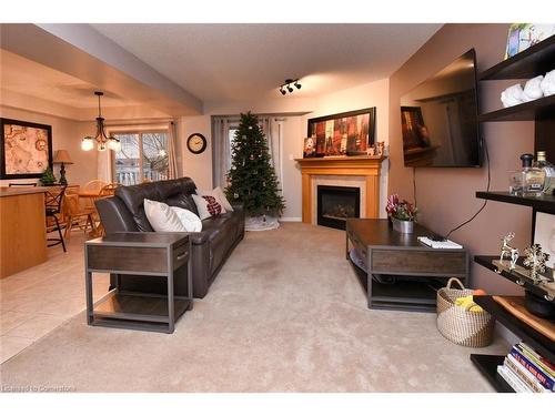 8-18 Cedar Street, Grimsby, ON - Indoor Photo Showing Living Room With Fireplace