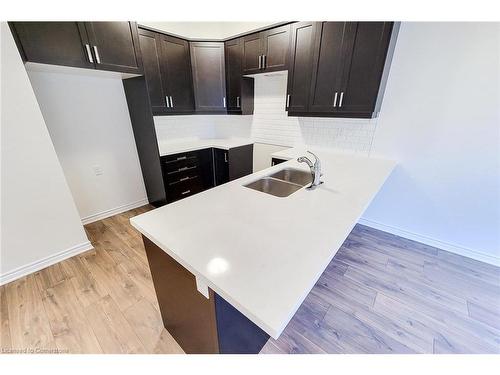 66-305 Garner Road W, Ancaster, ON - Indoor Photo Showing Kitchen With Double Sink